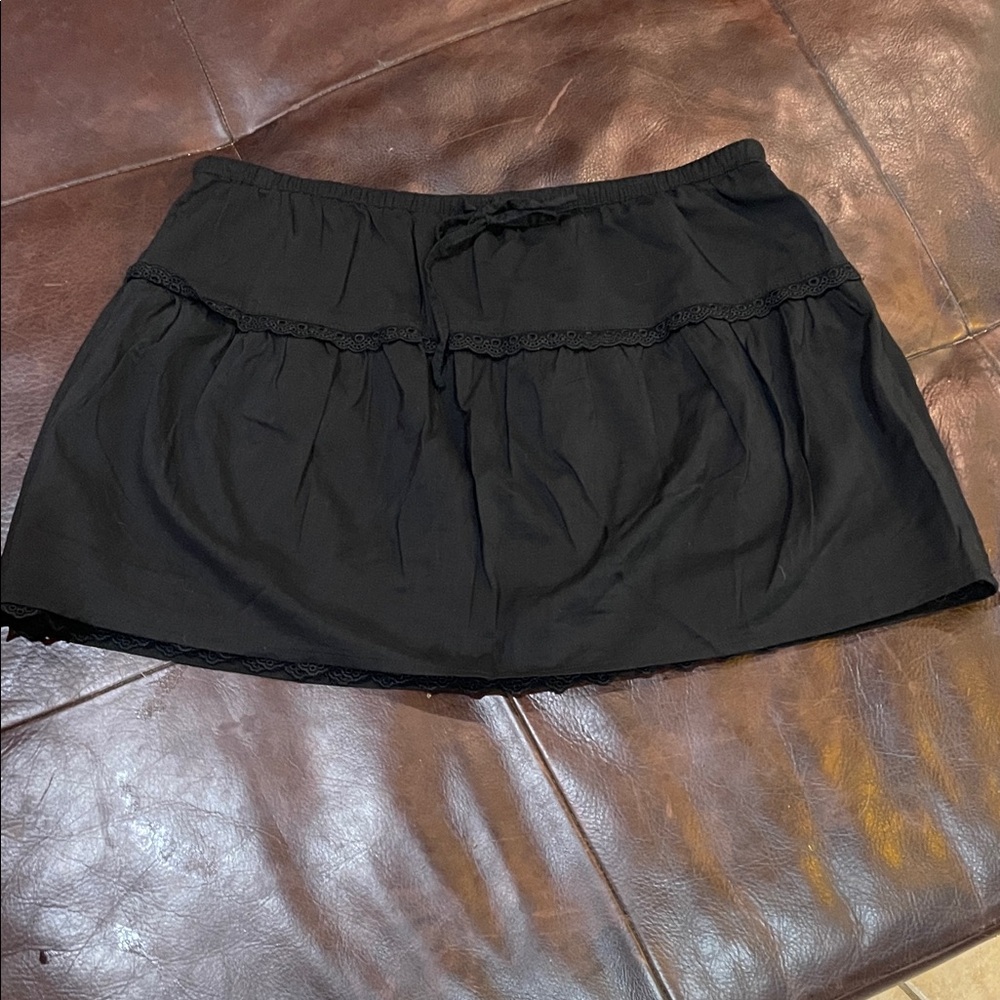 Reformation Black Drawstring Mini Skirt with Flace Lining.